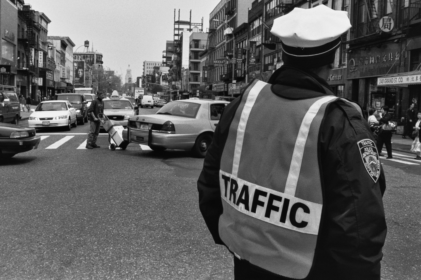 homepage image for New York album, depicting a traffic cop and street crossing